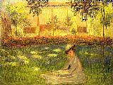 Woman Sitting in a Garden by Claude Monet